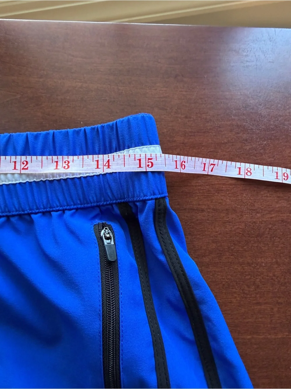 Fabletics Royal Blue Athletic Shorts with White Striped Waistband and Black Trim